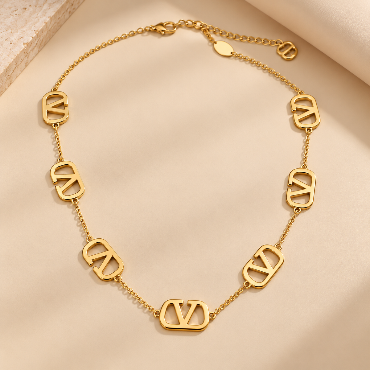Emblem Charm Necklace – Elegant Gold-Tone Chain