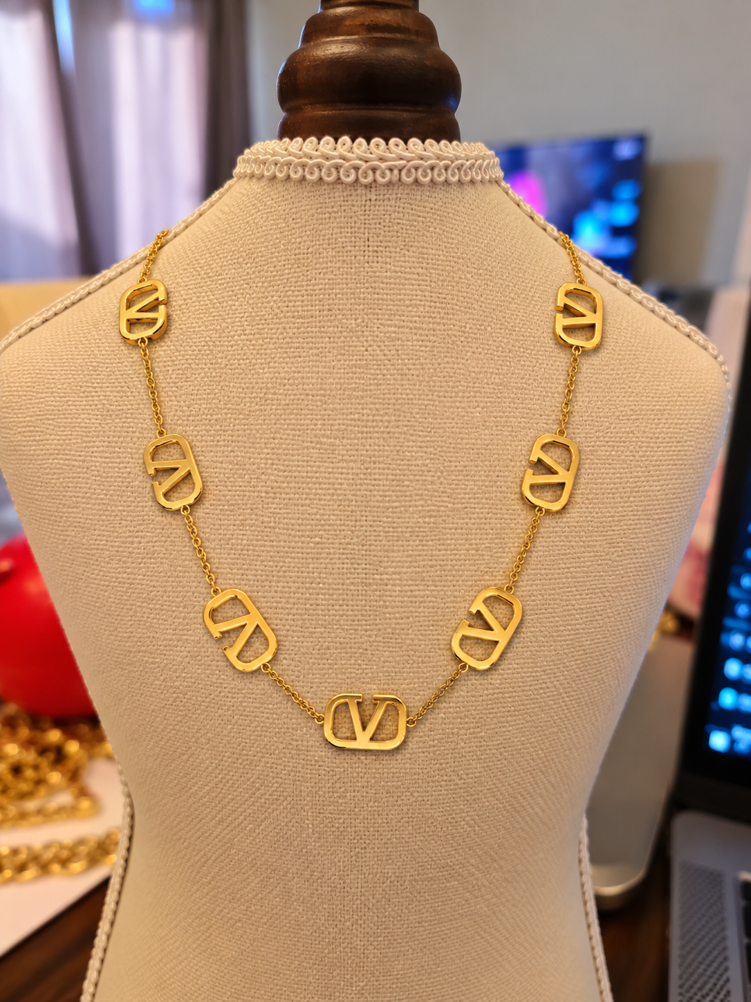 Emblem Charm Necklace – Elegant Gold-Tone Chain
